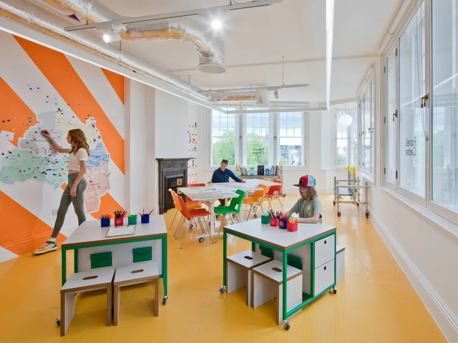 Two children and one woman use the facilities inside the Farrell Centre