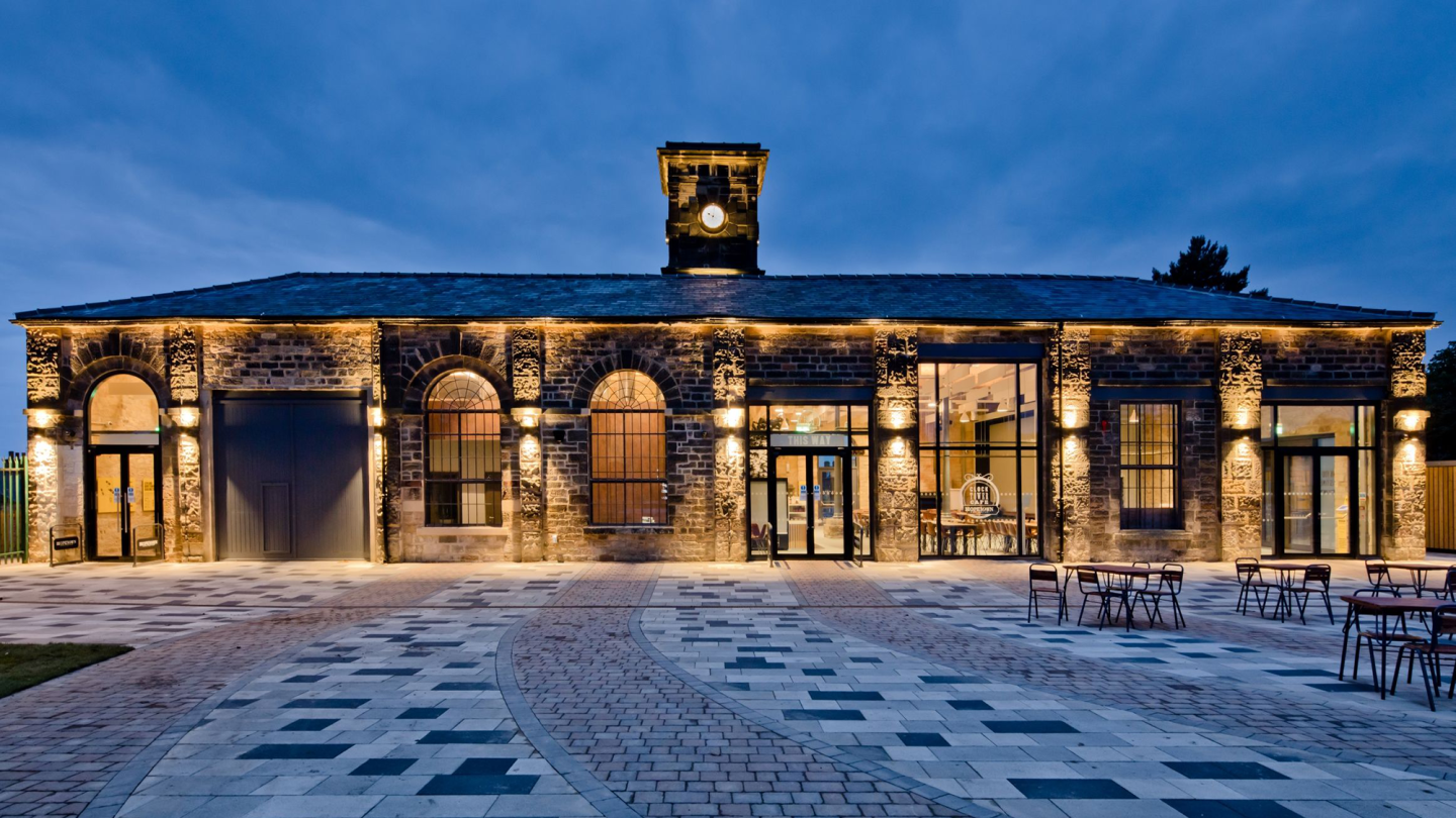 An image of  the Hopetown Clock Tower cafe exterior at dusk