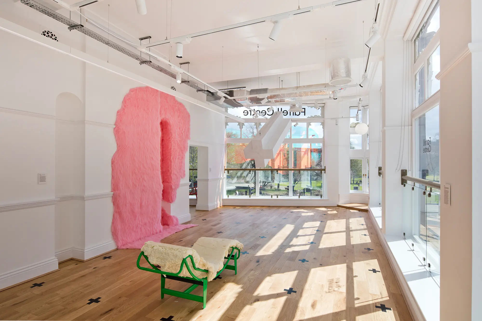 Natural light floods into the upstairs Gallery Room