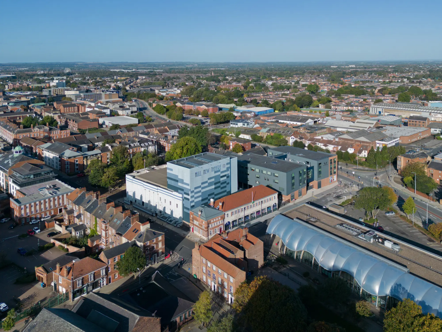 An aerial drone view of STEAM Studios and surrounding area from above