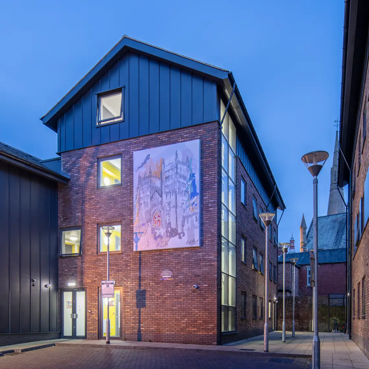 A rear view of the Three Tuns student accommodation at dusk