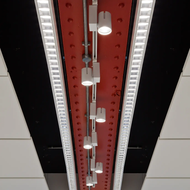 Ceiling details with textured red metal and light fixtures