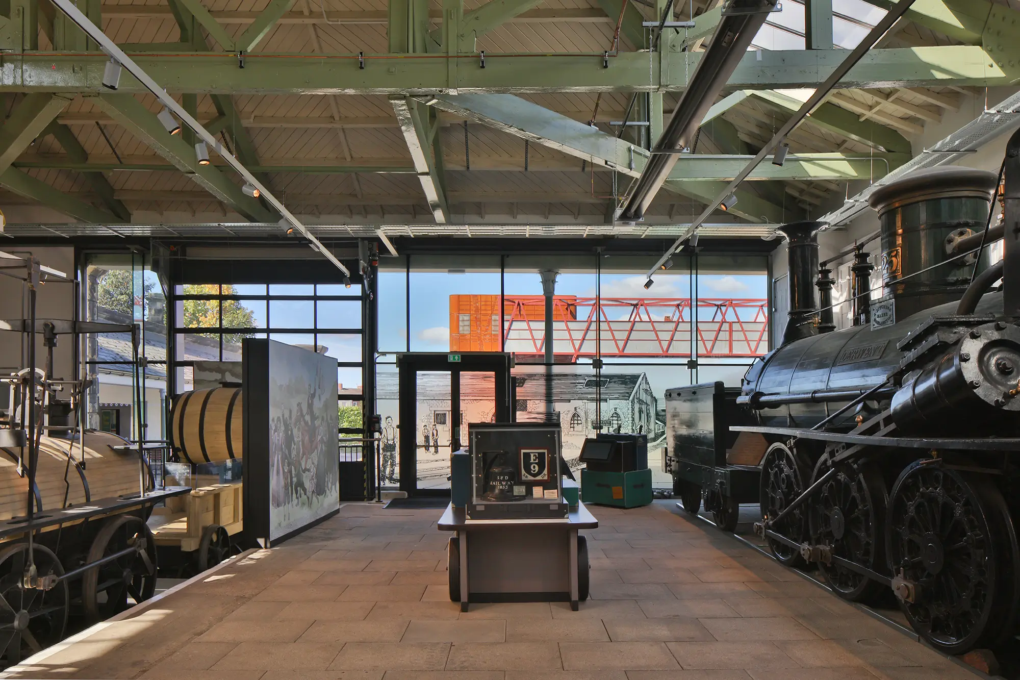 Parts of old steam trains are in a workshop museum