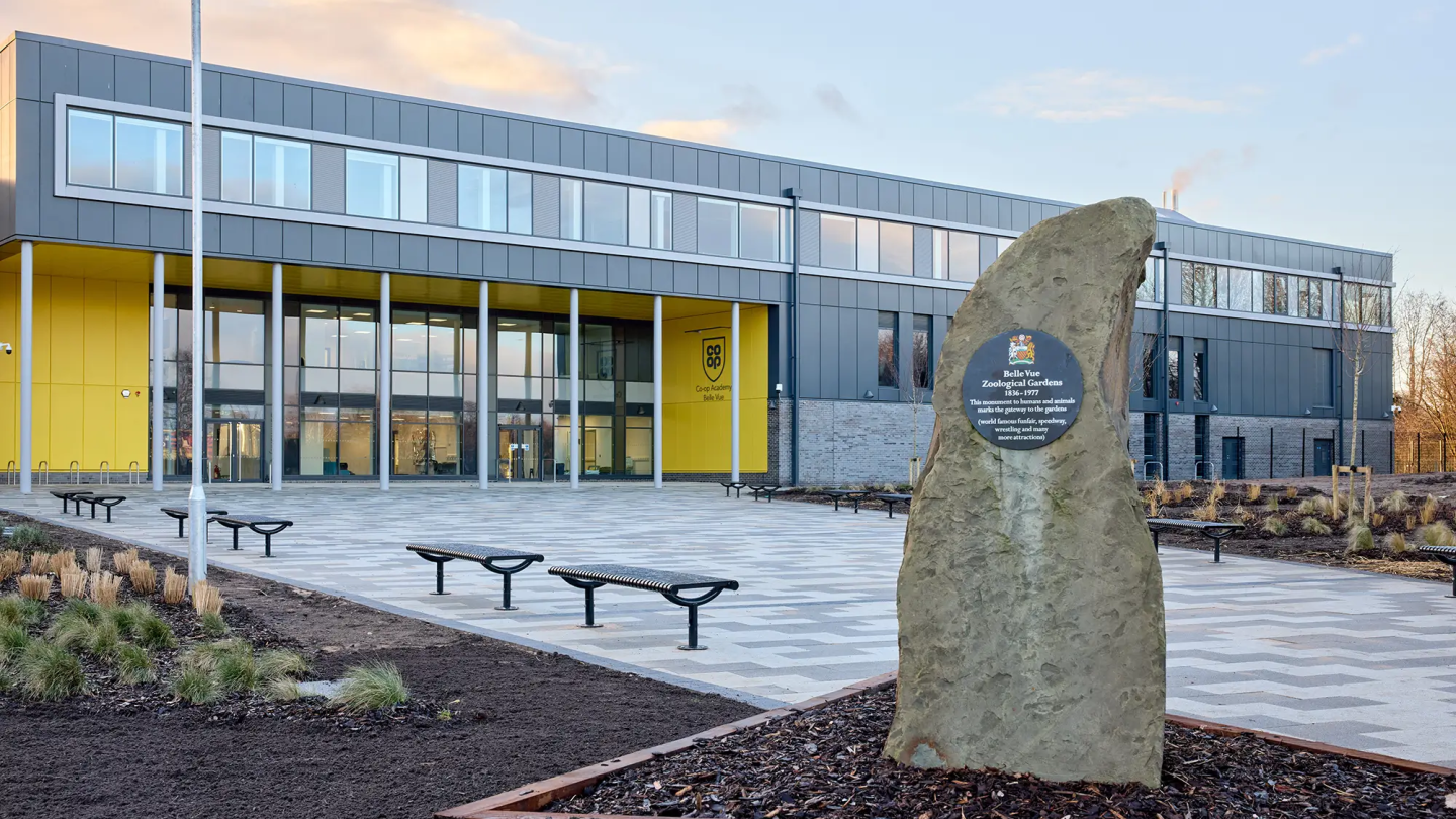 A front view of the Co-op Academy Belle Vue, with a plaque about the zoological gardens
