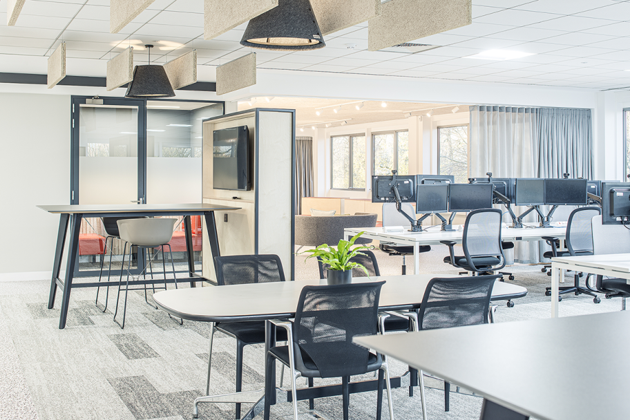 Spaceworks office new workstations with added tall desks and private meeting pods, as well as standard desks