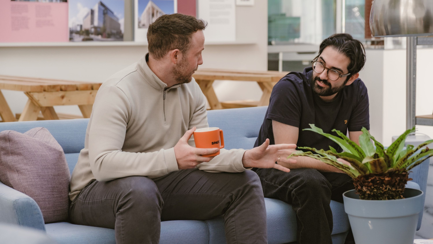Matthew Turnbull and Liam Clerkin Chat in the Atrium