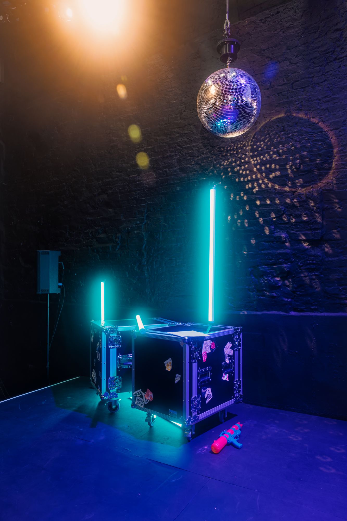 Stage with neon lighting and disco ball