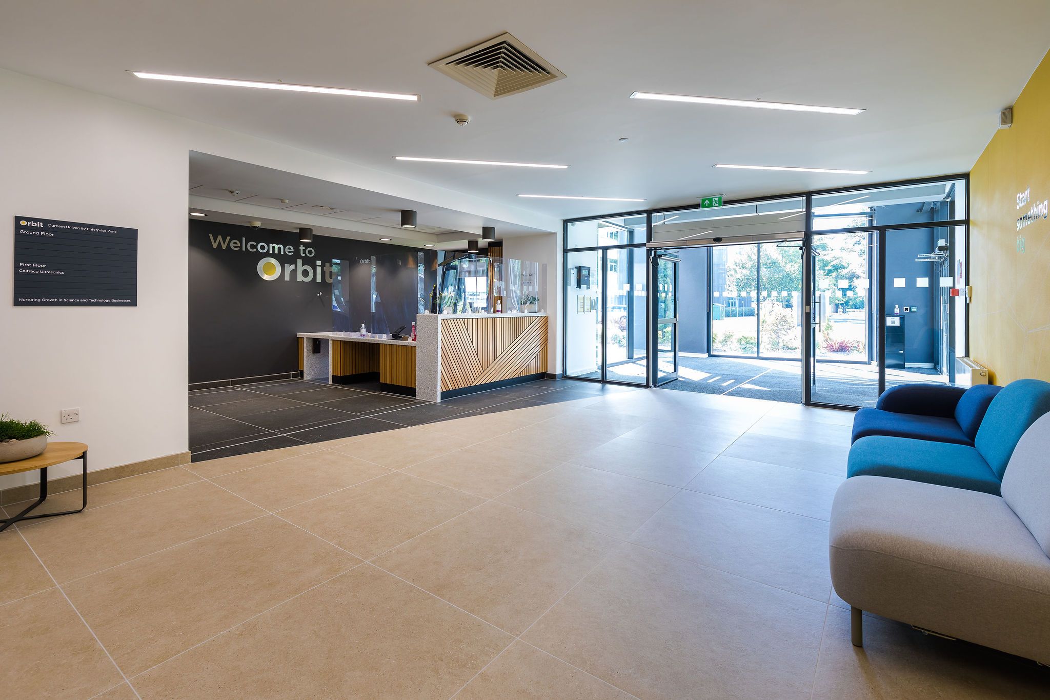 Durham University Orbit Building reception area with "Welcome to Orbit" wall display
